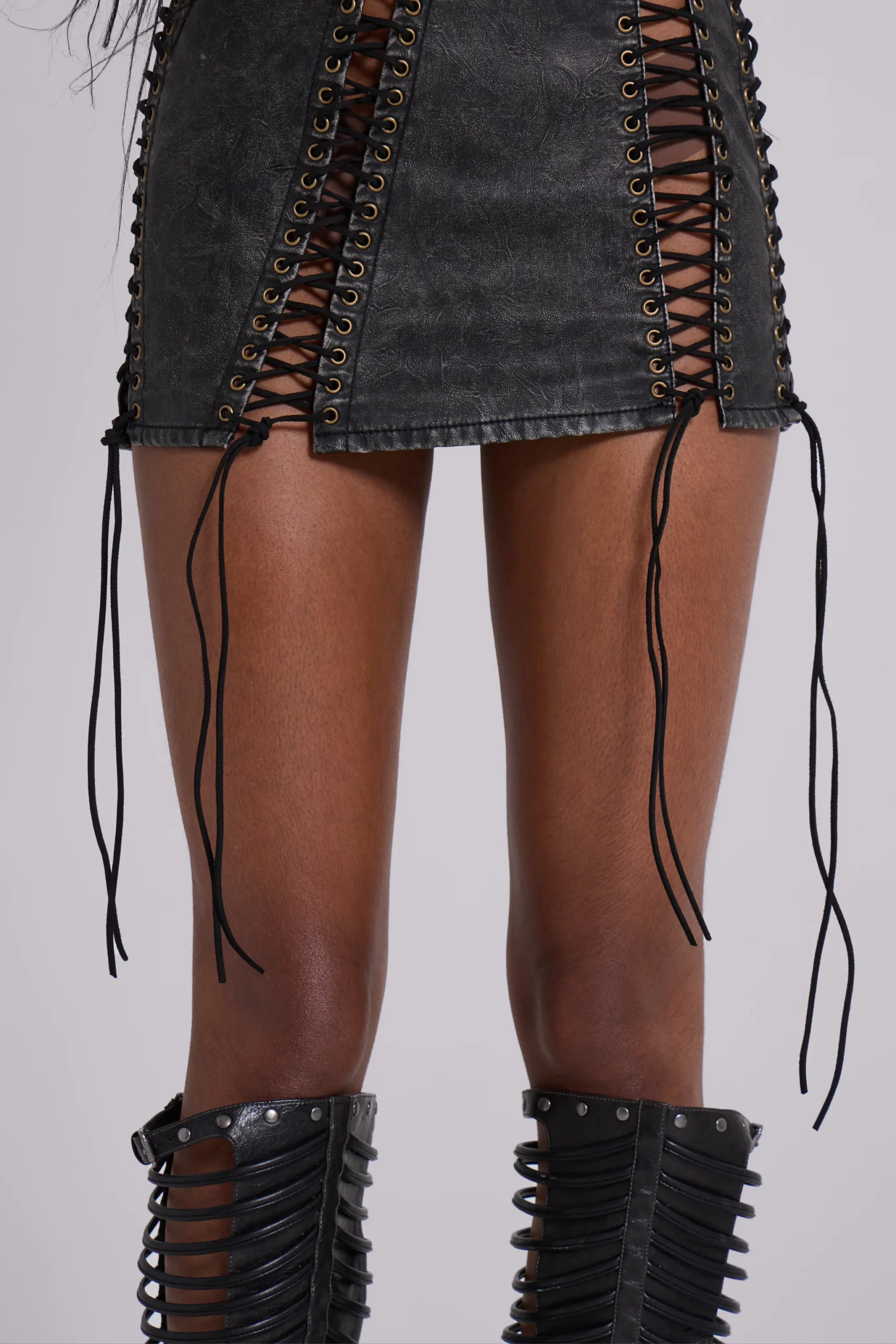 2724-odile-black-faux-leather-lace-up-mini-dress-7.webp Odile Black Faux Leather Lace Up Mini Dress