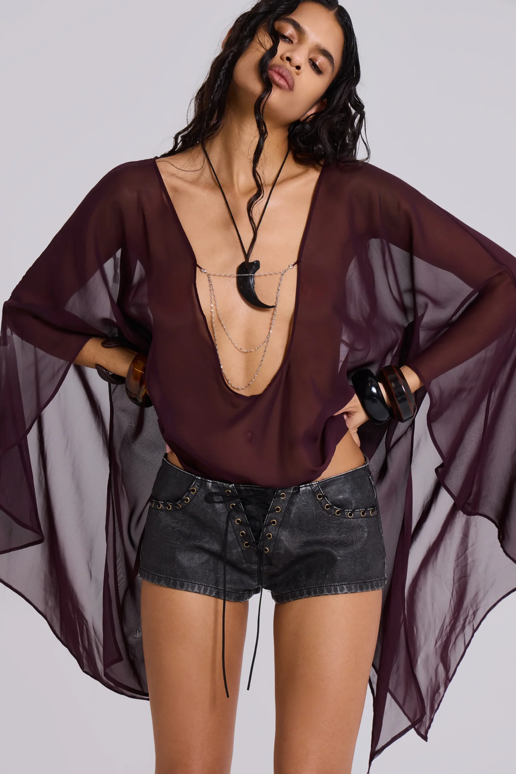 48-vaca-whipstitch-faux-leather-mini-shorts-in-black-3.webp Vaca Whipstitch Faux Leather Mini Shorts in Black
