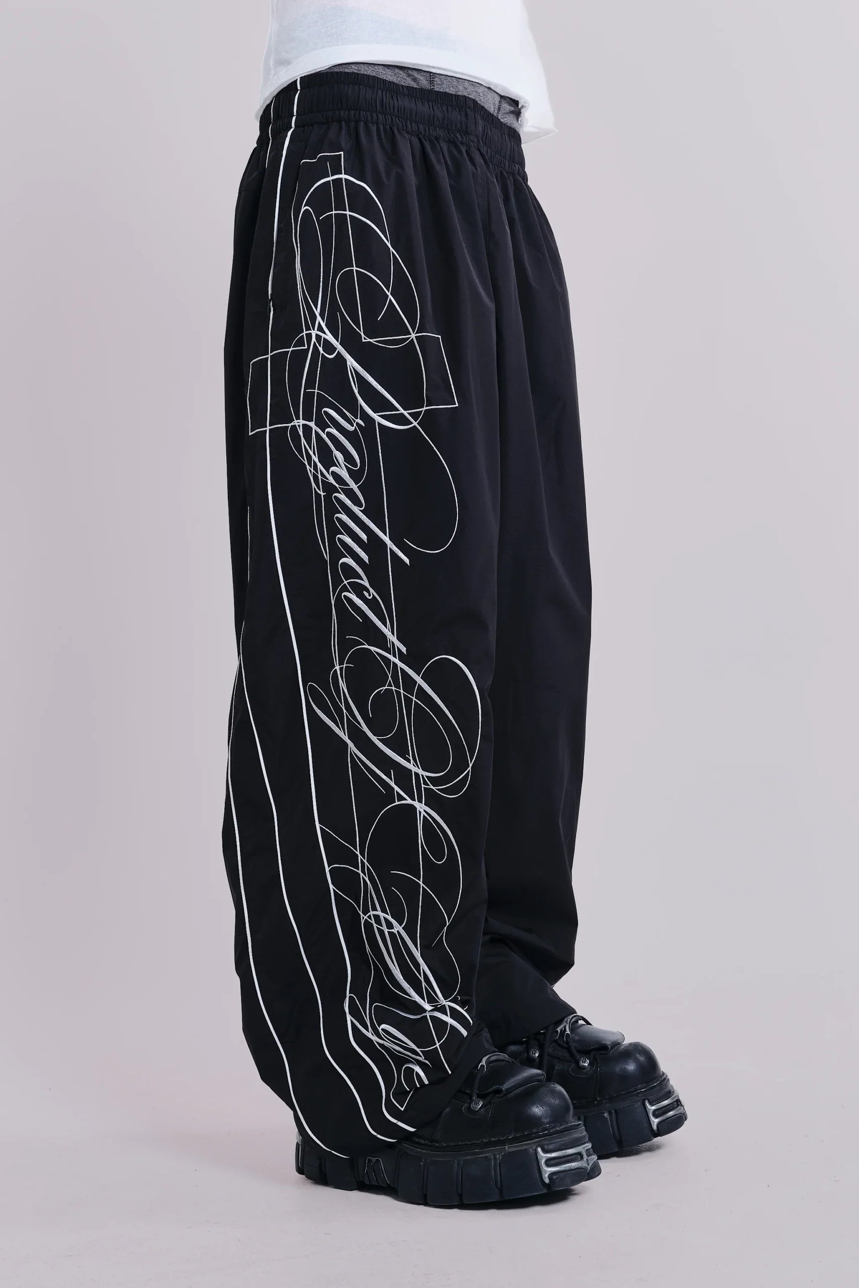 5825-p-o-a-black-vapor-tracksuit-bottoms-1.webp P.O.A. Black Vapor Tracksuit Bottoms