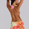 6804-lucia-backless-mini-dress-with-flower-detail-1.webp Lucia Backless Mini Dress With Flower Detail