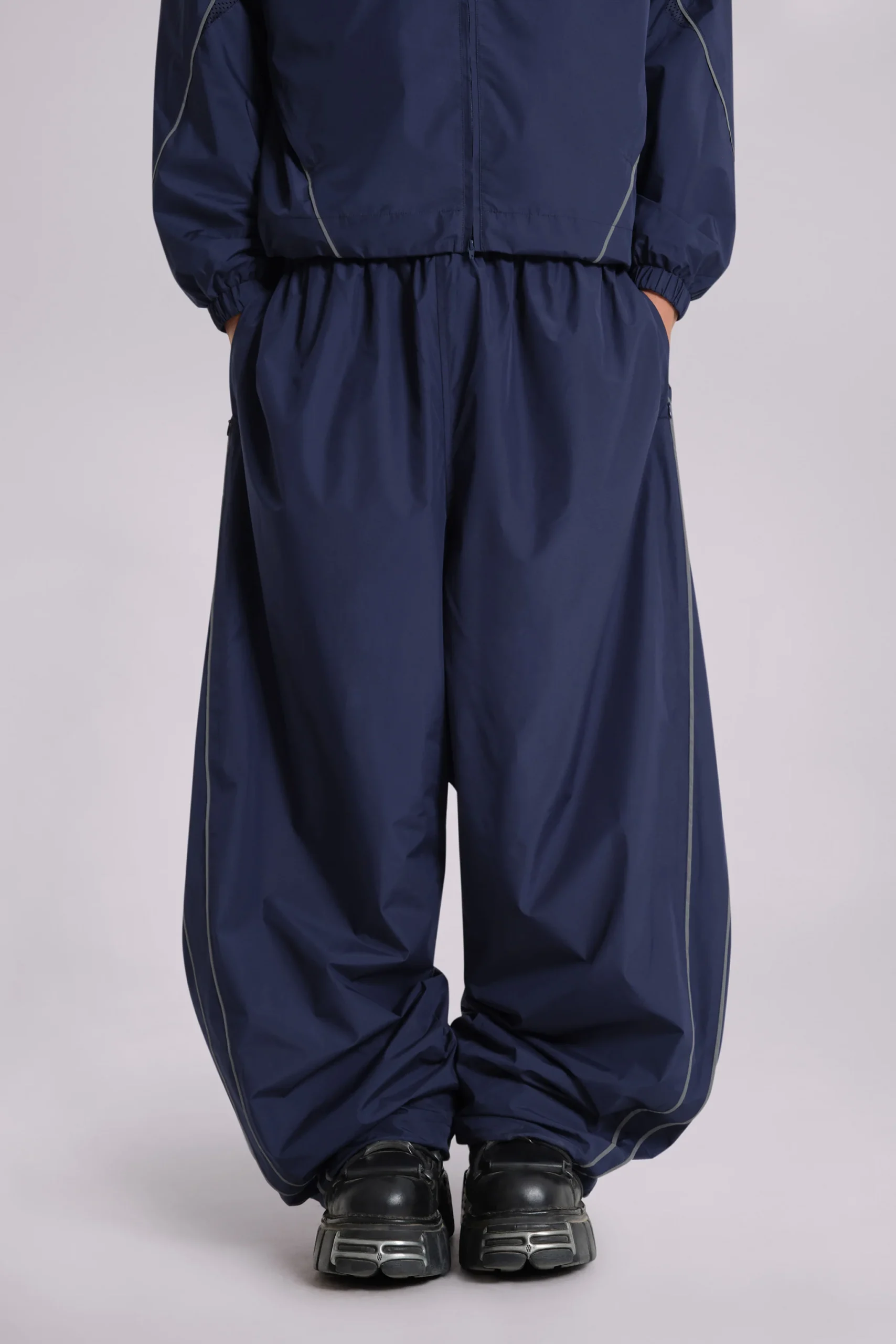 9112-navy-vapor-tracksuit-bottoms-11.webp Navy Vapor Tracksuit Bottoms